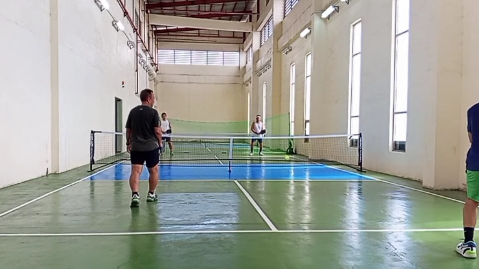 CitiLoft pickleball with four players - serving stance