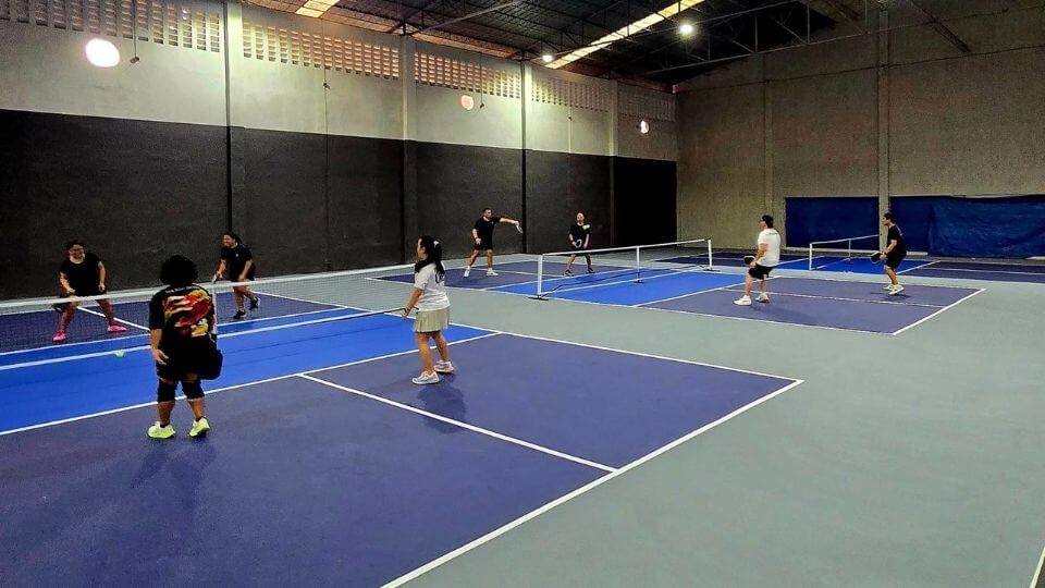 Kitchenline Pickleball courts - two courts played by two groups of four