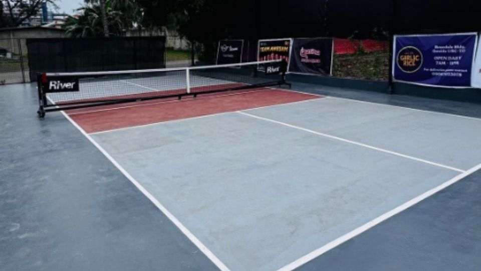 Qusina pickleball court angled view late afternoon shot